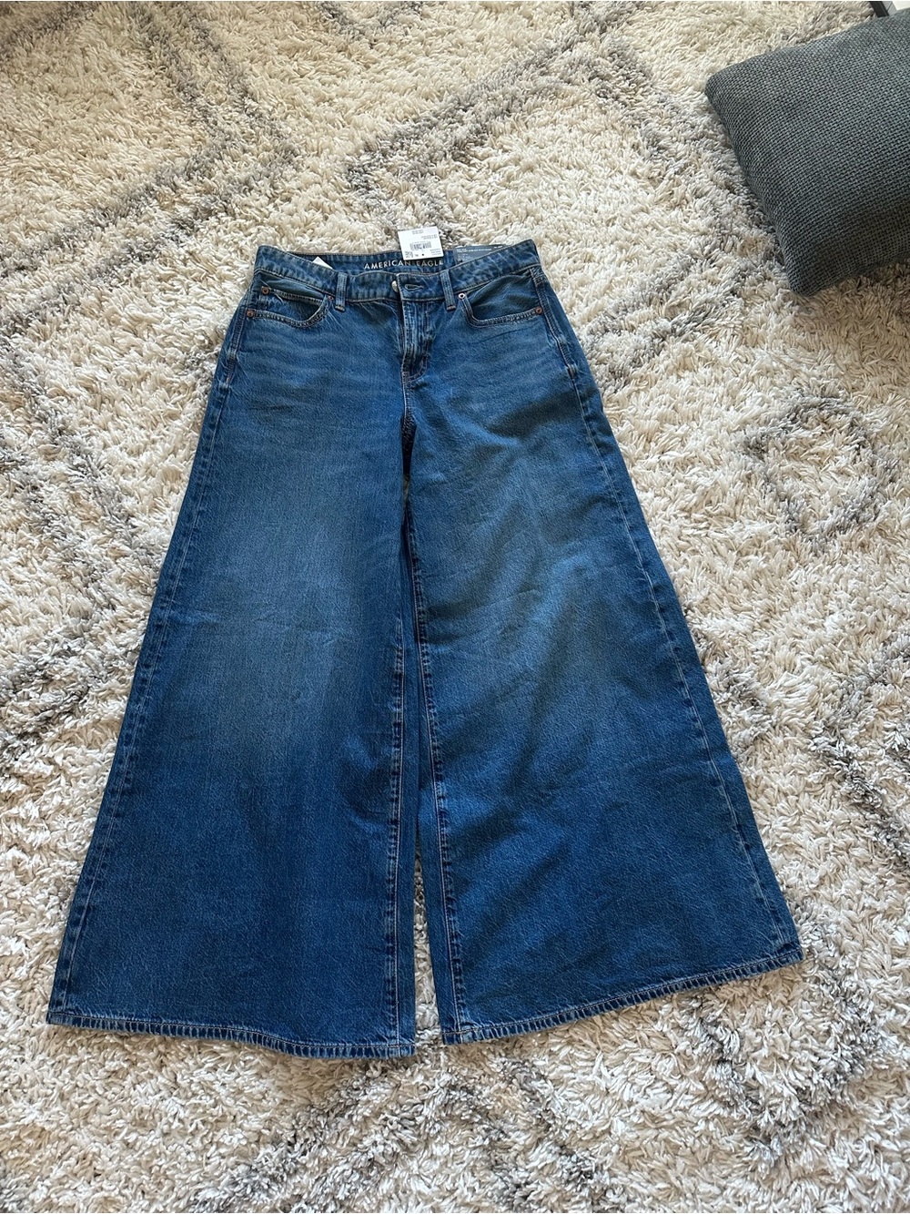 American Eagle women’s AE Dreamy Drape Strigid A-Line Fit Jean size 4/27W
